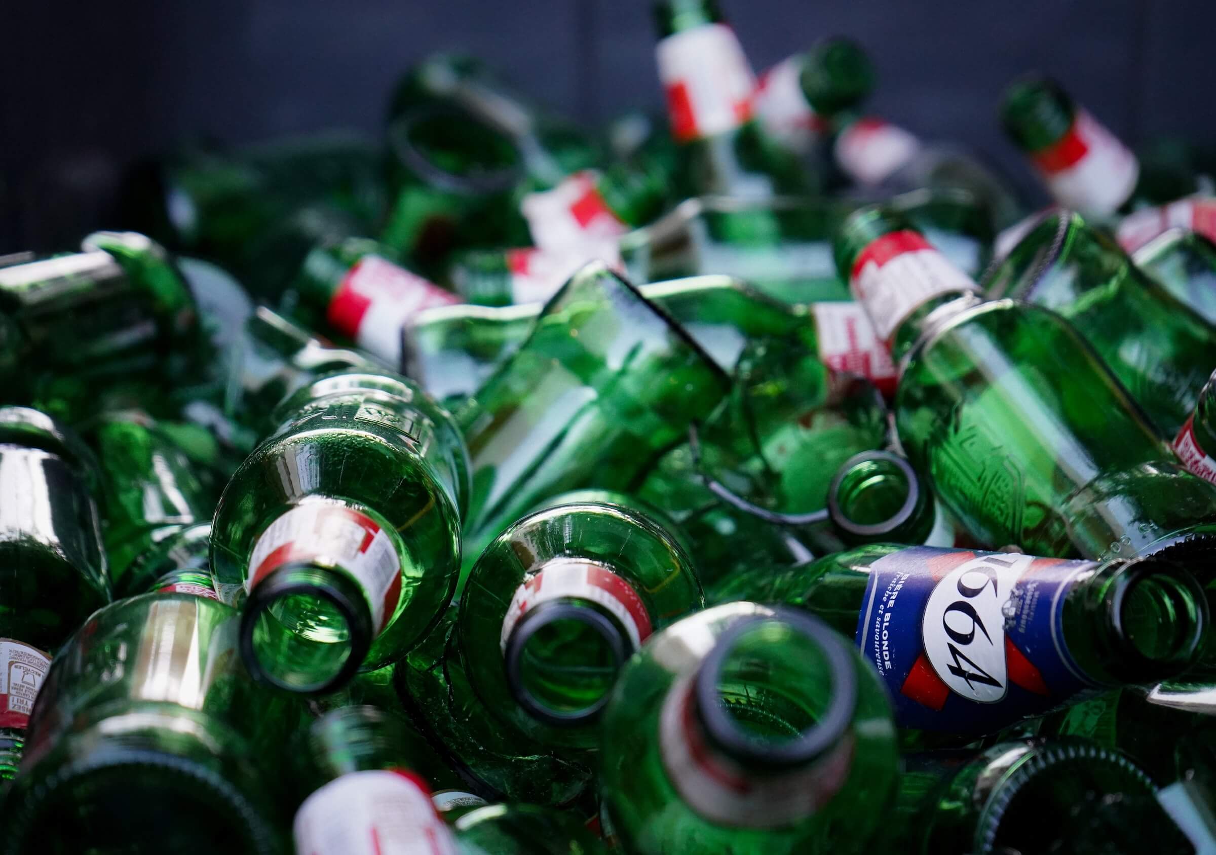 glass bottles in a fairfax county purple bin